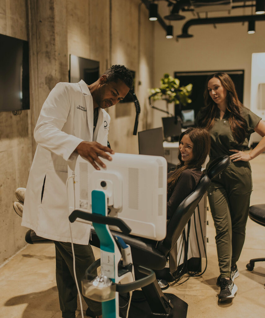 Dr. Brice consulting with a patient at Elevation Orthodontics in Nashville, TN
